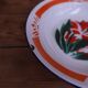 Vintage hollow plate in Chinese enamelled tin.