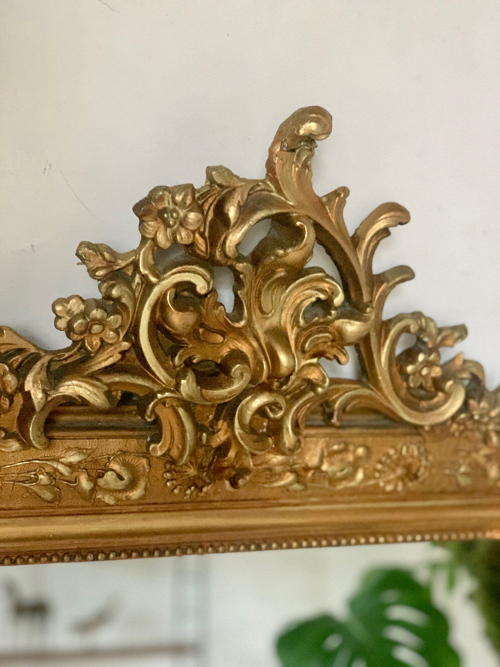 Gilded fireplace mirror with pediment
