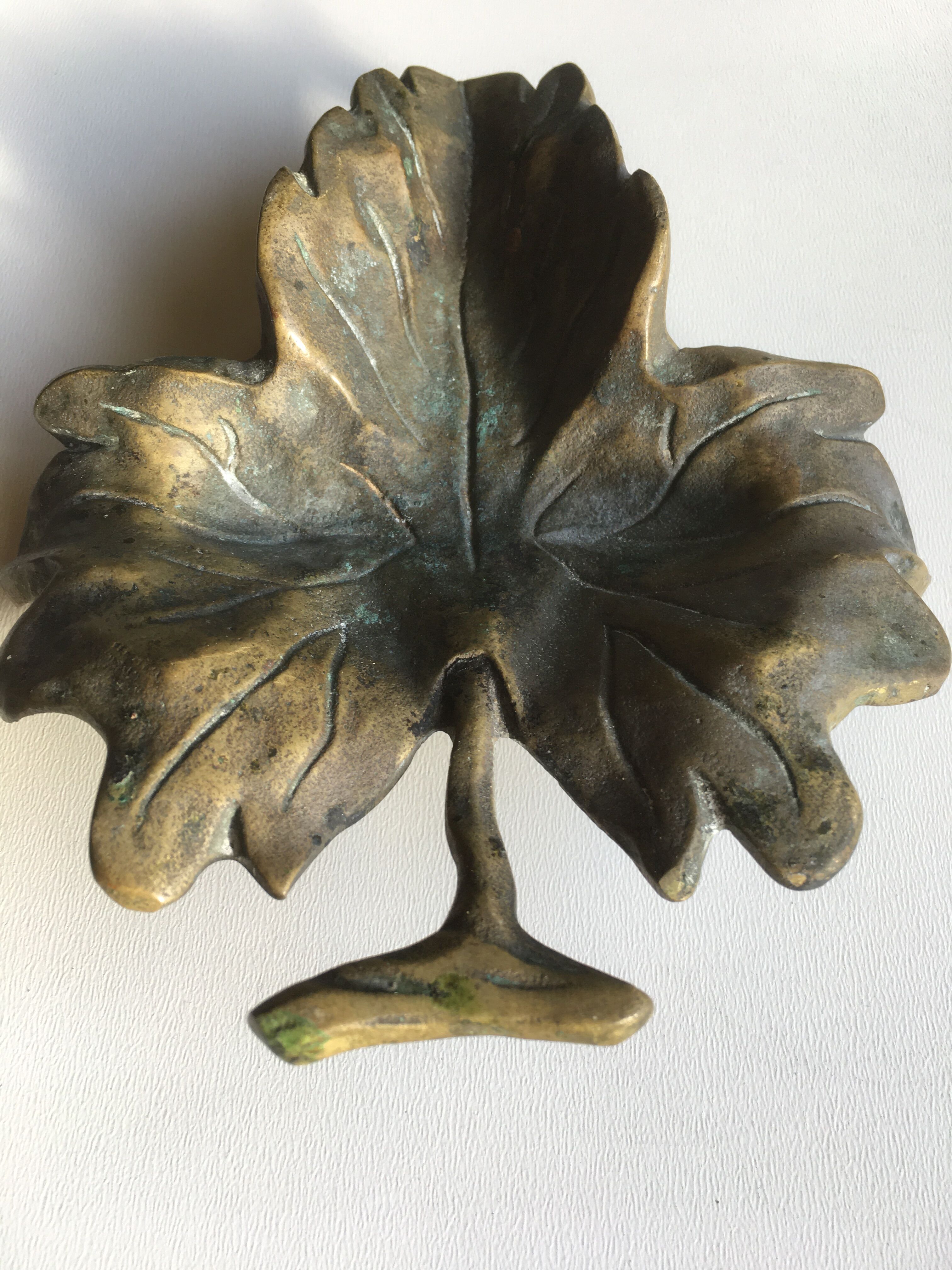 Empty pocket or ashtray leaf in old bronze