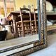Rectangular Napoleon III mirror in moulded black and gold wood with engraved mirror decoration.