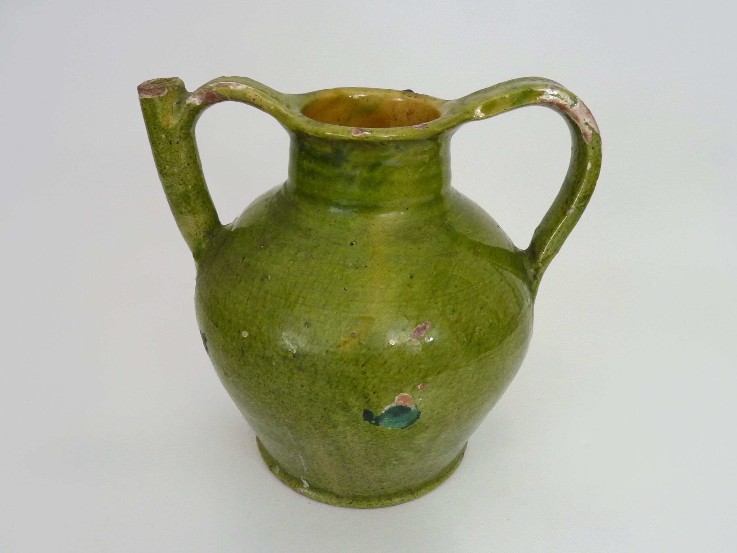 Orjol water pitcher pottery in green glazed terracotta. Pyrenees XIXth