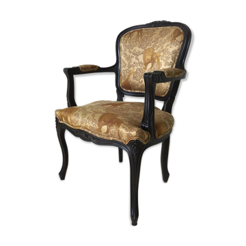 Black baroque armchair with fabric designed by wildlife by Ascension Latorre, Spain