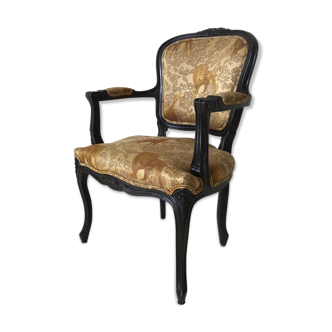 Black baroque armchair with fabric designed by wildlife by Ascension Latorre, Spain