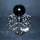Vintage white and black polka dot glass perfume bottle and round bakelite cap
