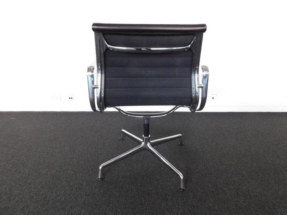 Vintage chair by charles eames ea 108 black leather edition vitra denmark