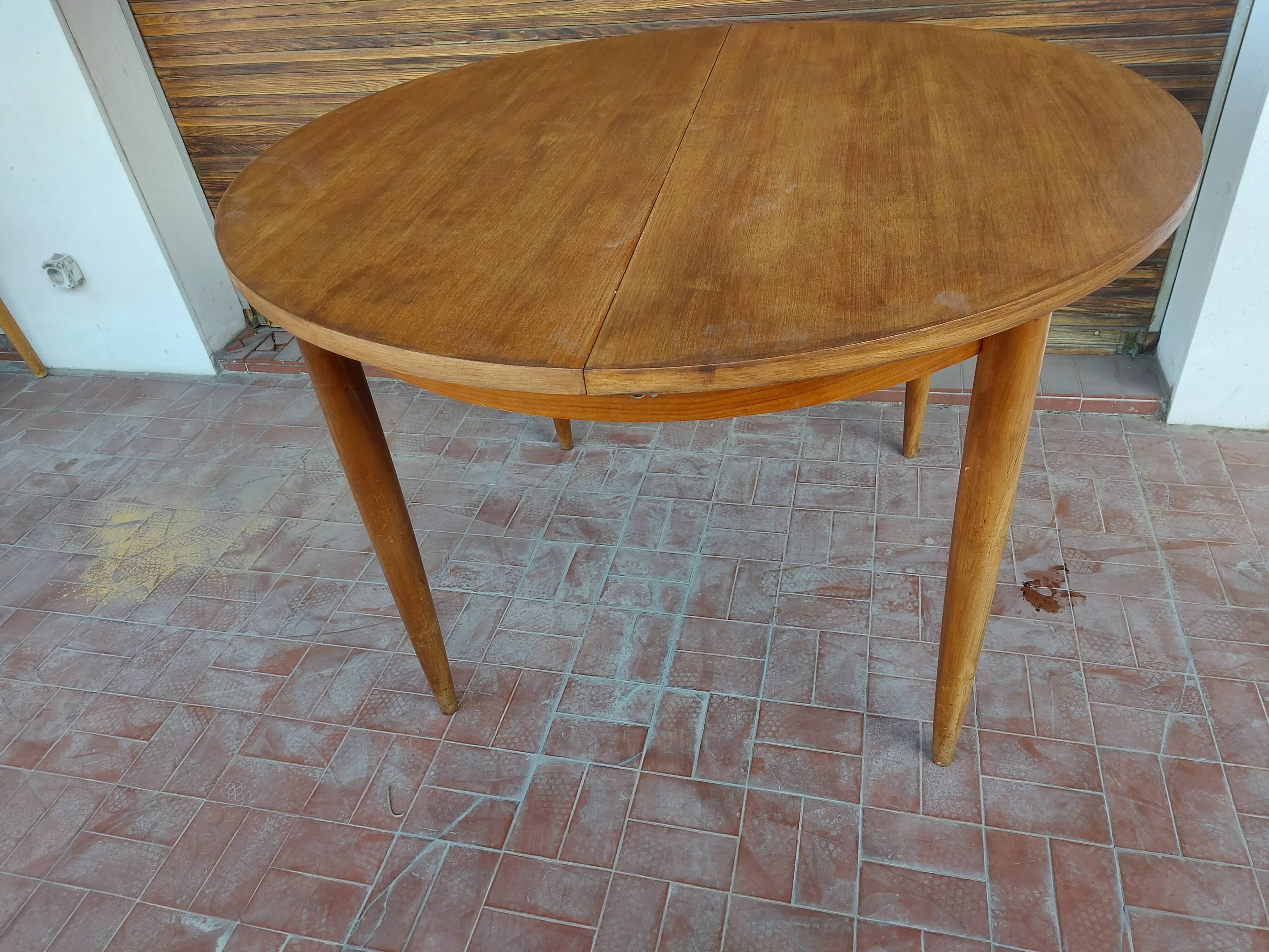 Scandinavian design teak table with extension cord