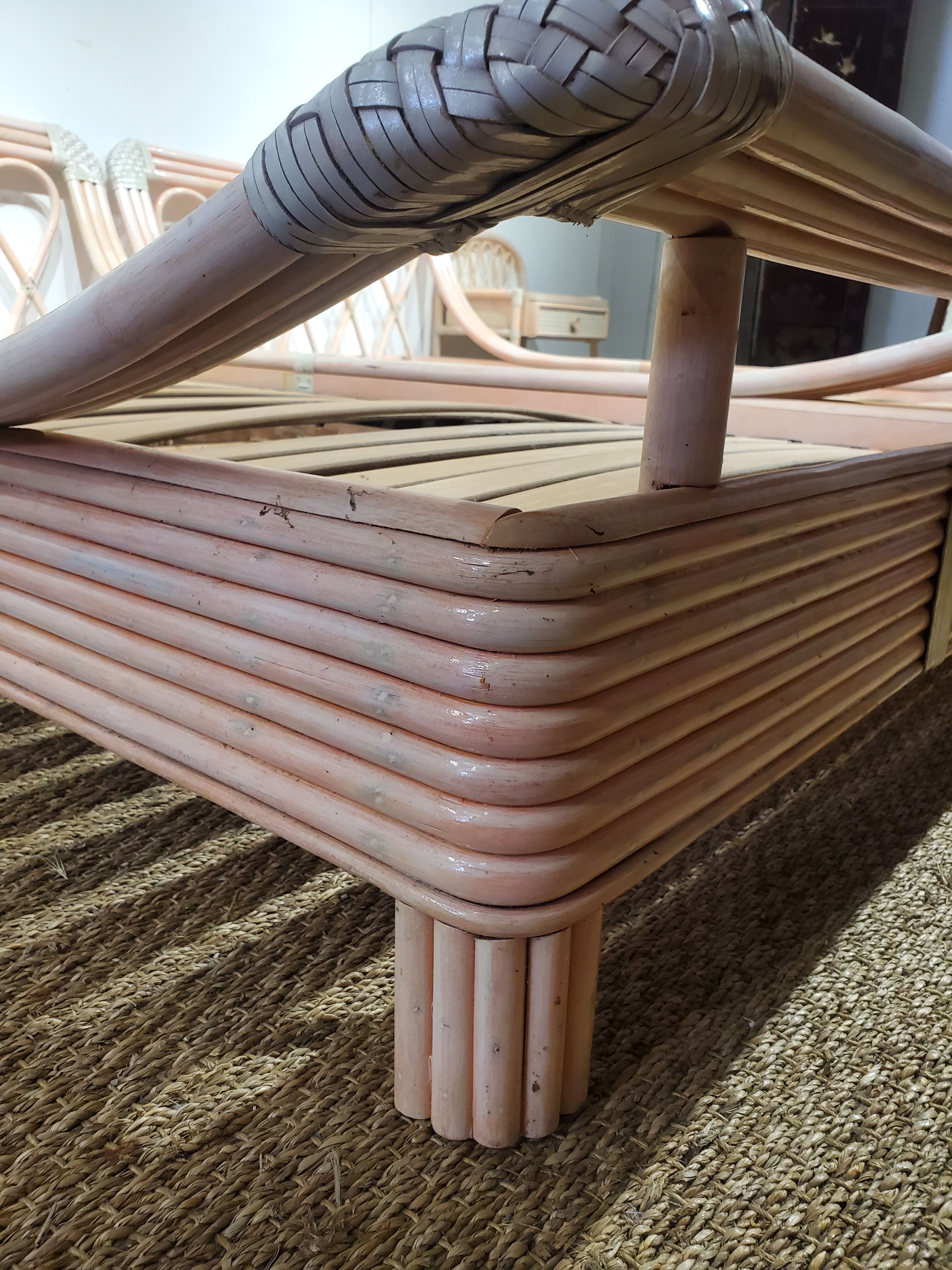 Pink rattan bed and bedside table set