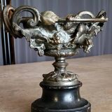 Patinated bronze cup, richly decorated with foliage and bunches of grapes