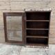 Art Deco wall display cabinet in Burmese teak with original patina.