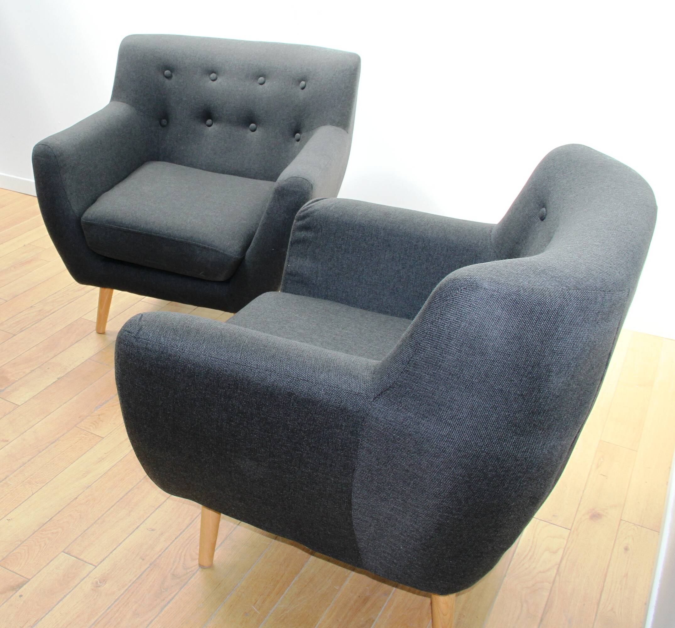 Pair of designer armchairs