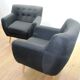 Pair of designer armchairs