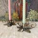 Pair of silver metal flower candle holders