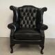 Fauteuil bergère chesterfield cuir noir