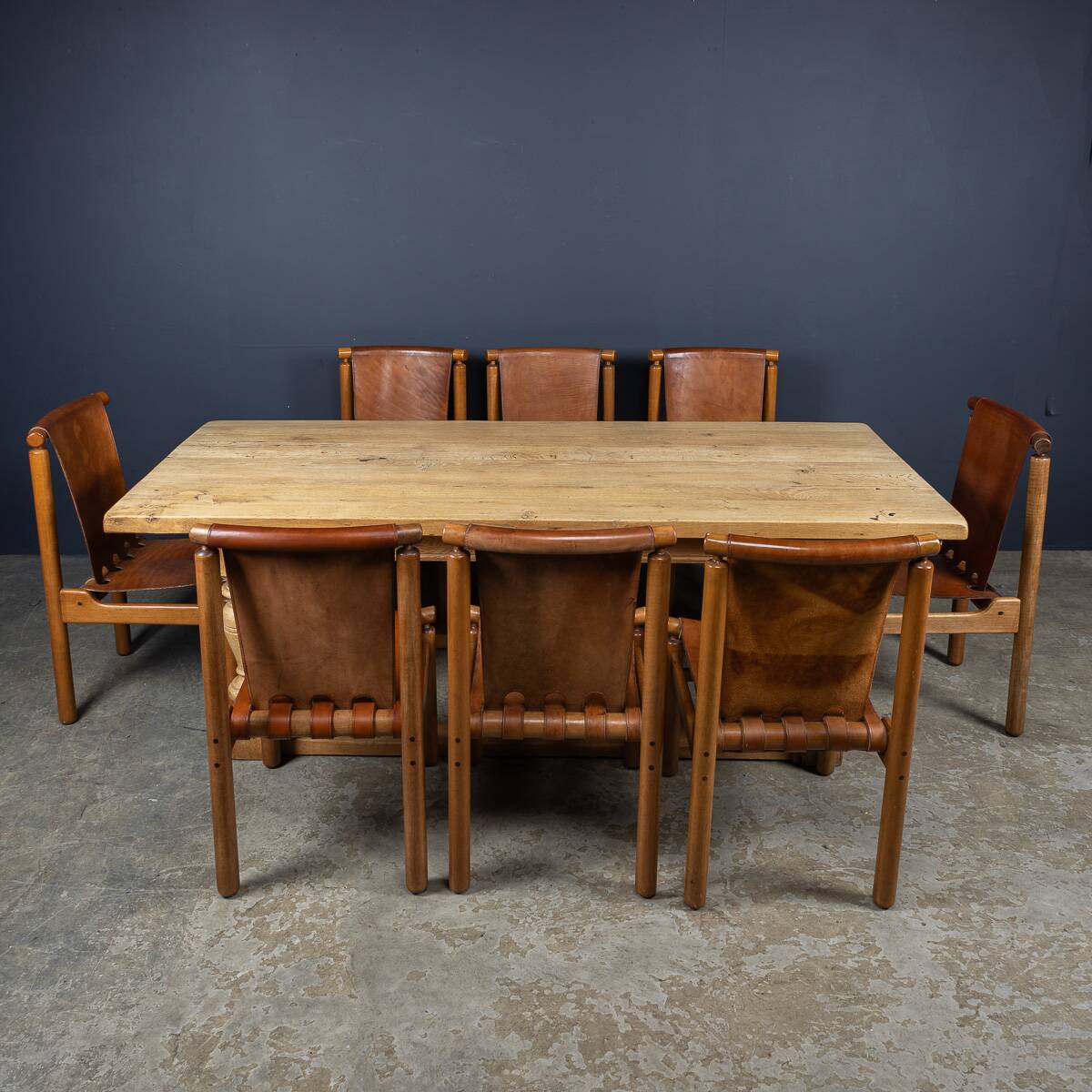 A SUPERB 20thC SET OF EIGHT ILMARI TAPIOVAARA LEATHER DINING CHAIRS c.1950