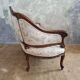 Small sofa or bench in Louis XV style, rococo.
