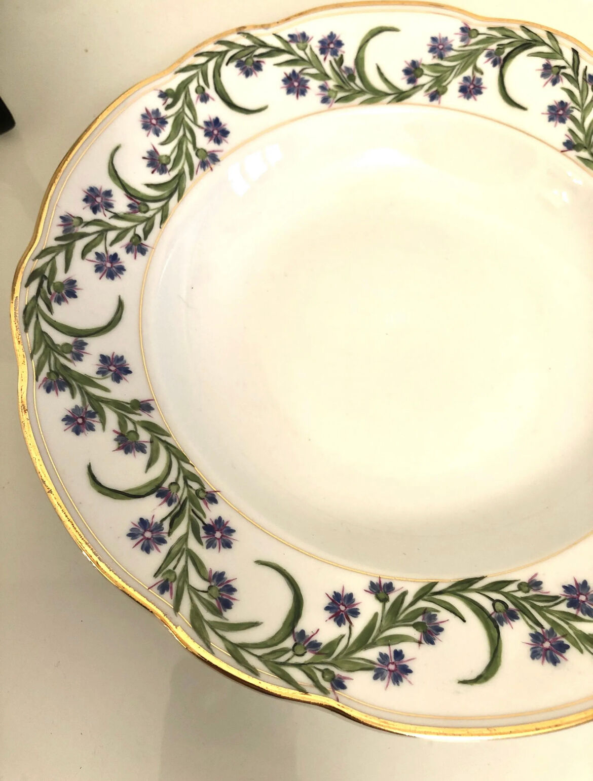 4 hollow porcelain plates
