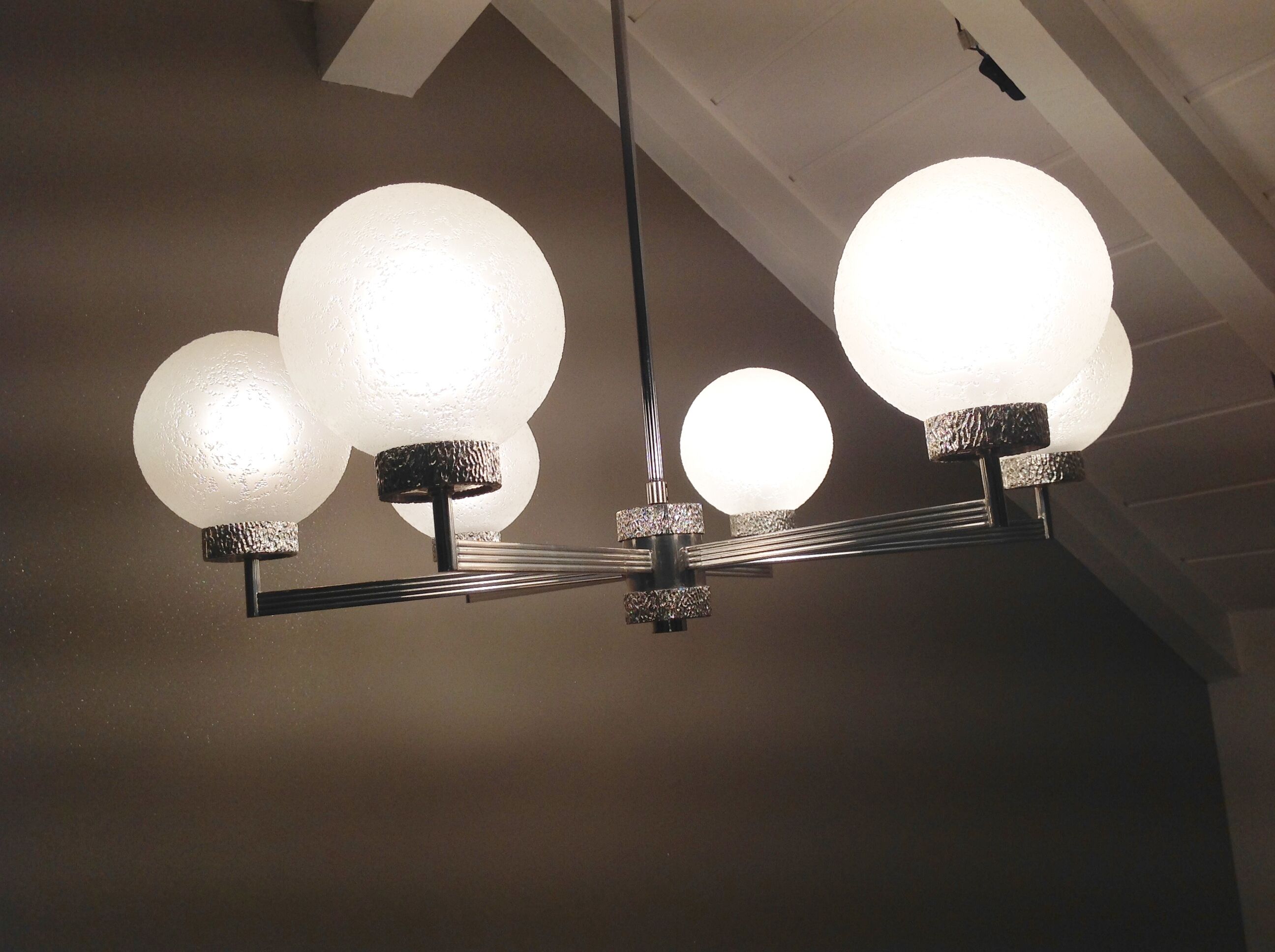 Six-light chrome metal chandelier and opaque glass globes / vintage 60s and 70s