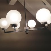 Six-light chrome metal chandelier and opaque glass globes / vintage 60s and 70s
