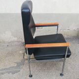 Vintage leather and teak armchair