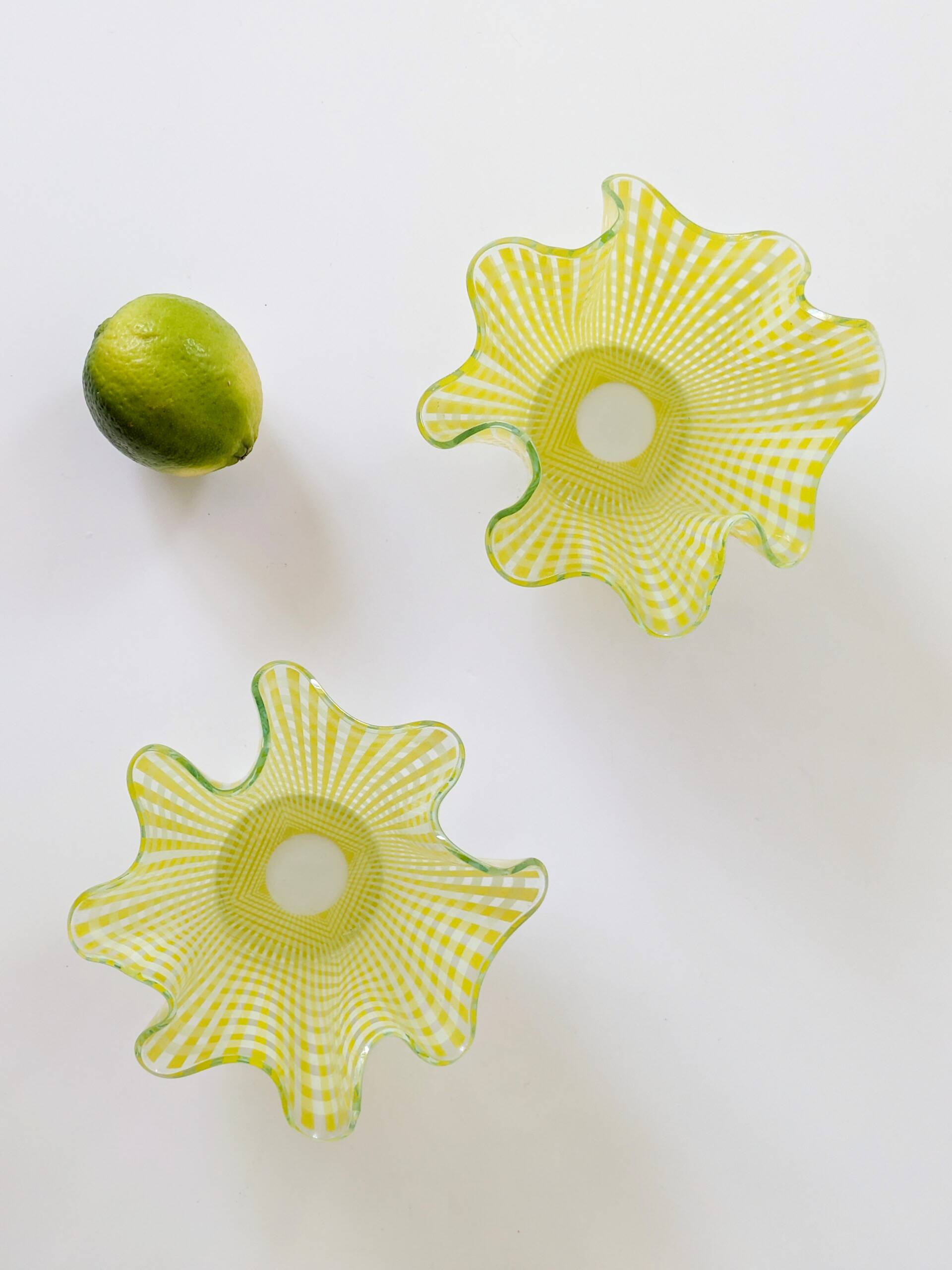 Pair of "Gingham" Chance Brothers cups with yellow checkered pattern and wavy edges.