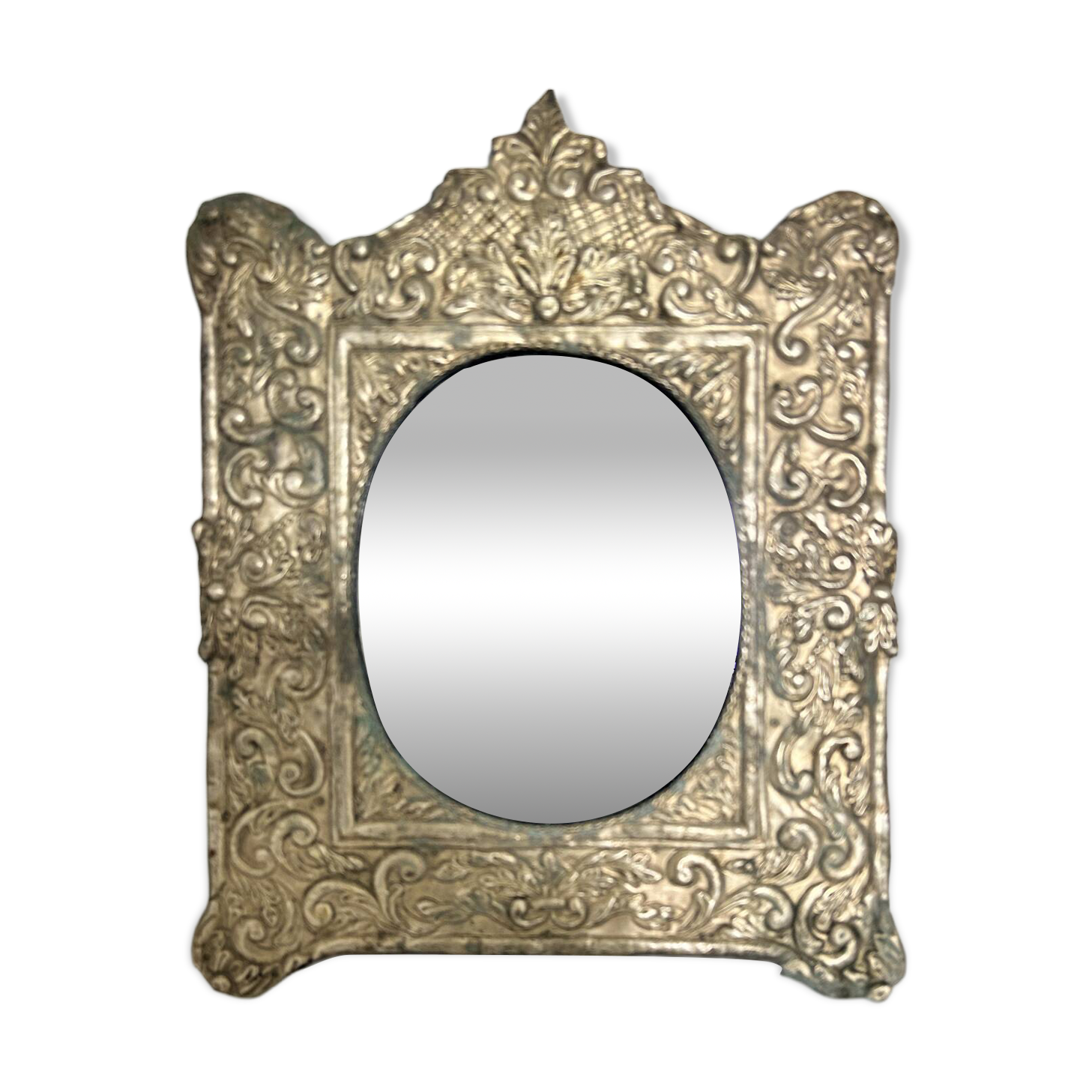 Baroque mirror in repoussé brass