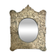 Baroque mirror in repoussé brass