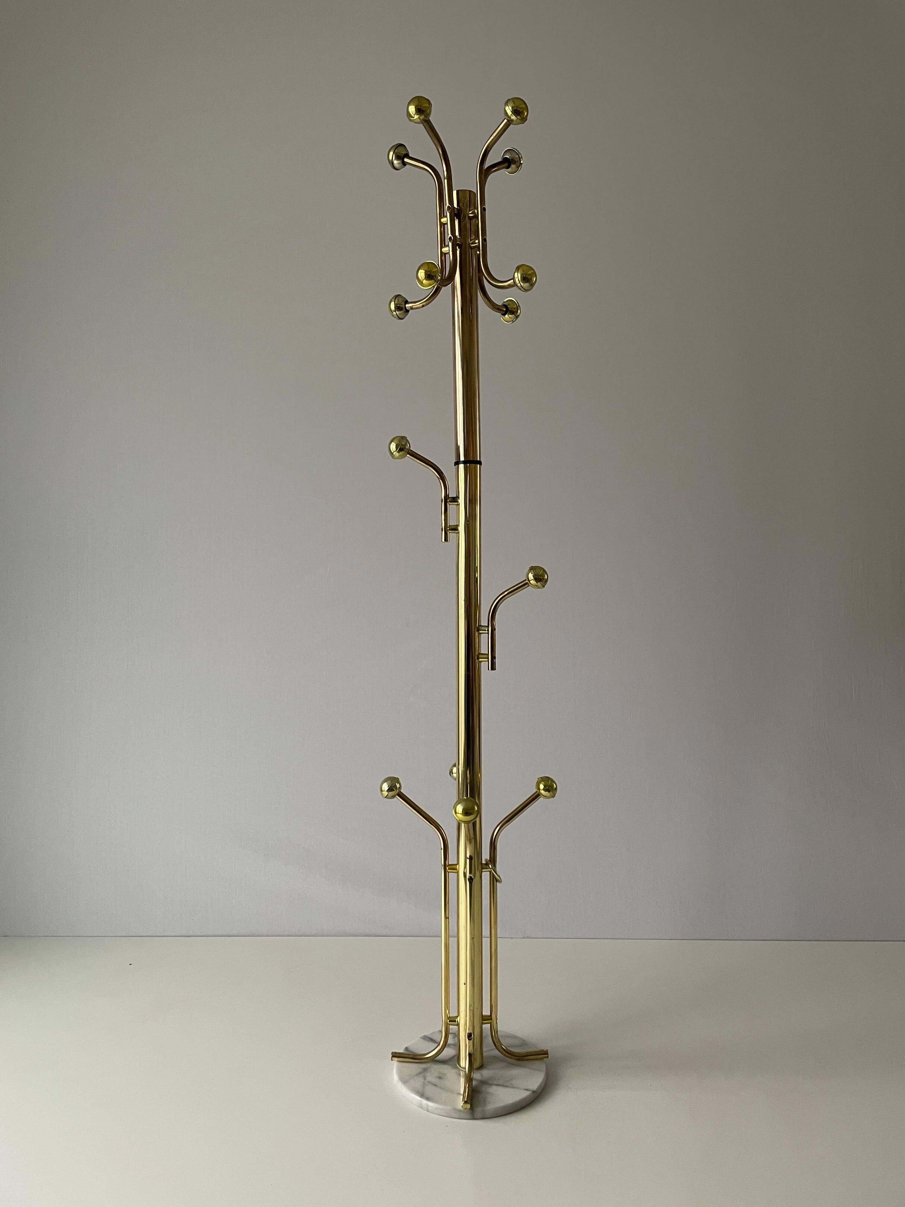 Free-standing coat rack in plexiglass with a marble base, 1960s, Germany.