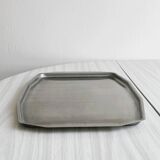 Rectangular stainless steel tray.