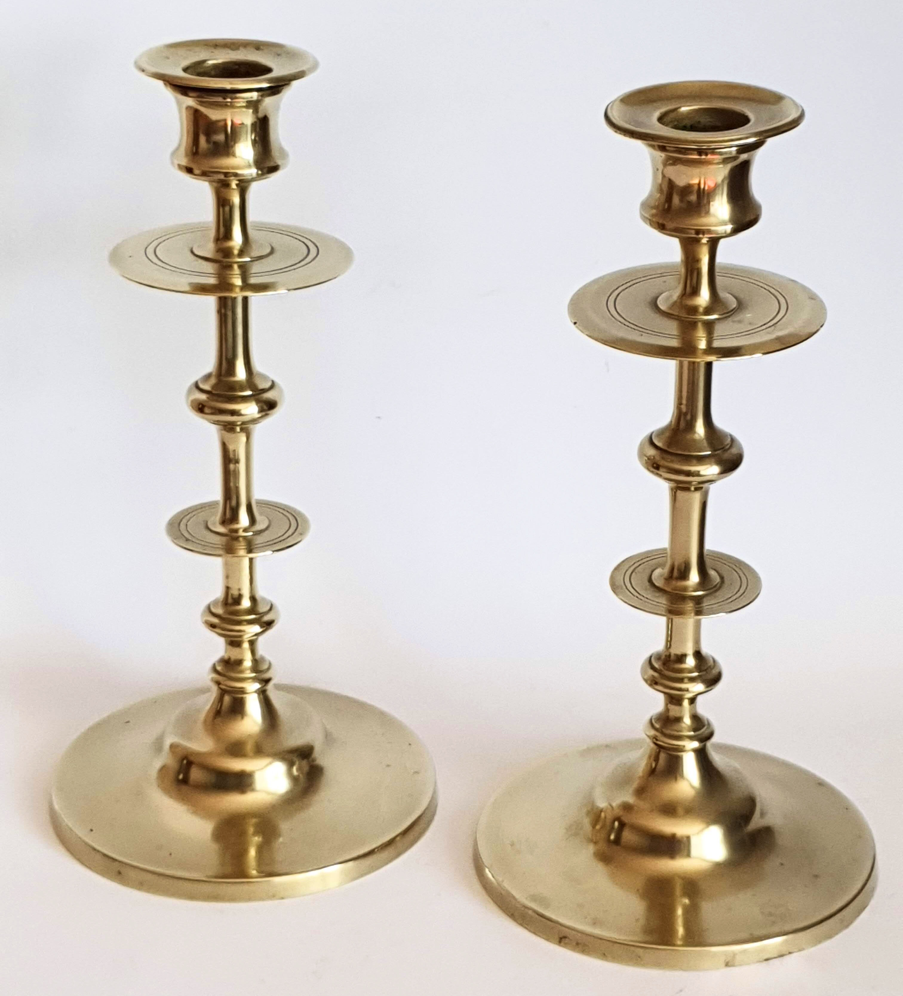 Duo of brass candle holders