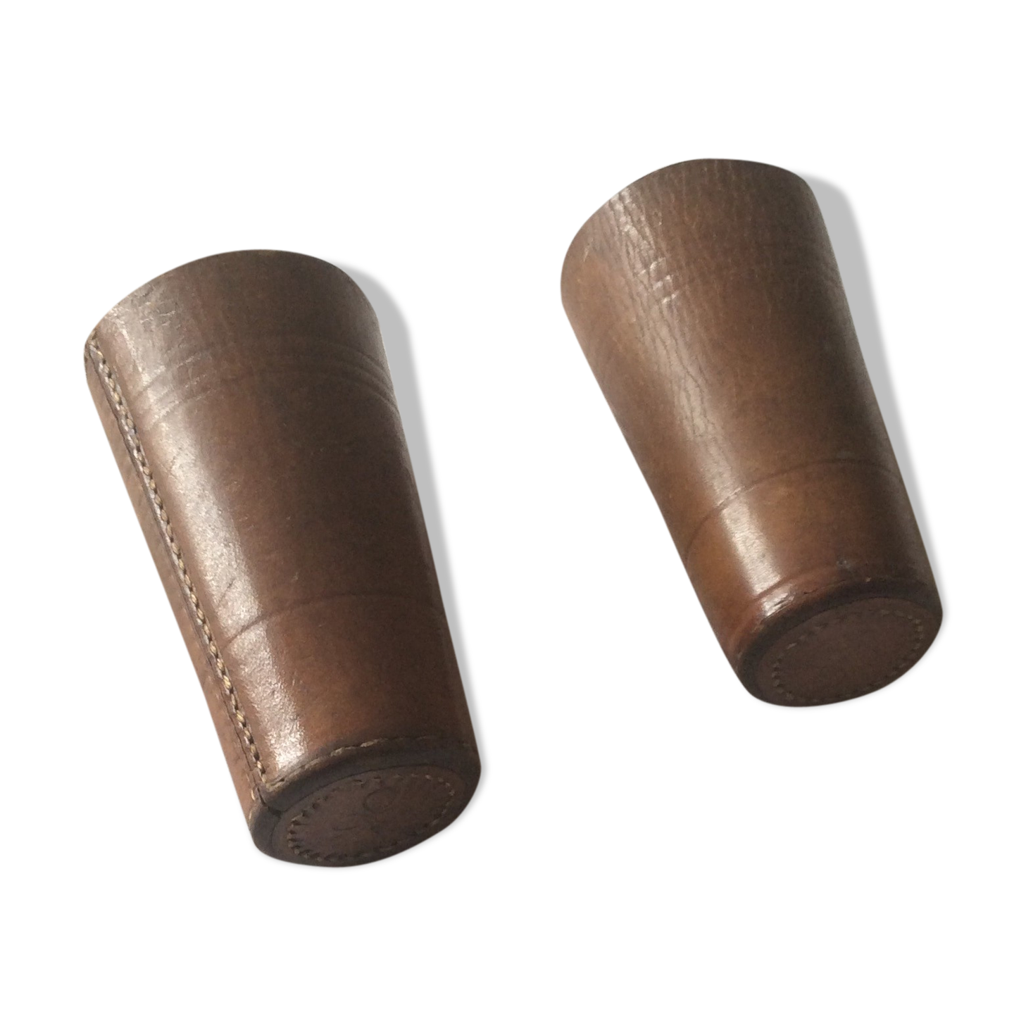 Pair of old brown leather dice cups