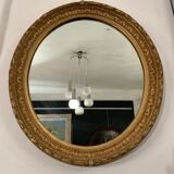 Old oval mirror, period XIXth