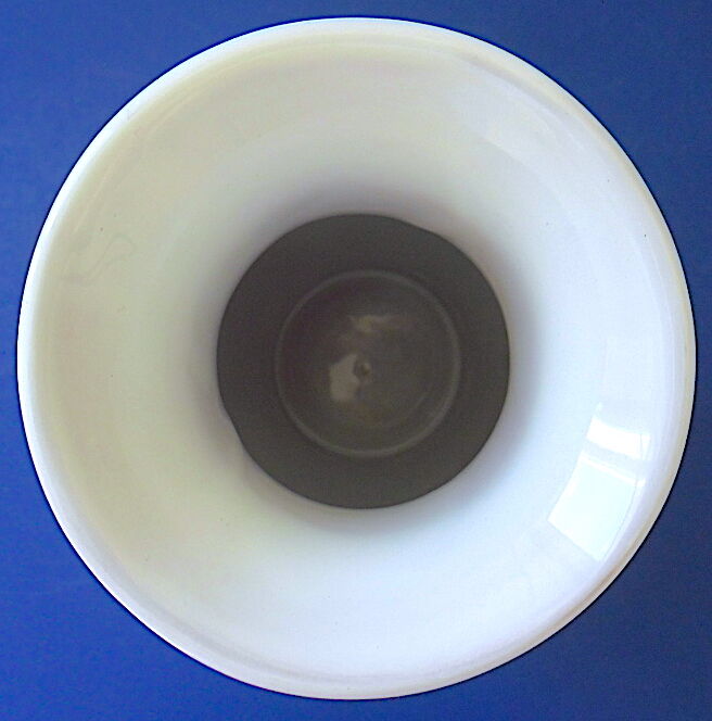 White-blue earthenware vase with stylized plant decoration