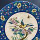 Large circular earthenware dish from Louvière with Longwy style bird decoration