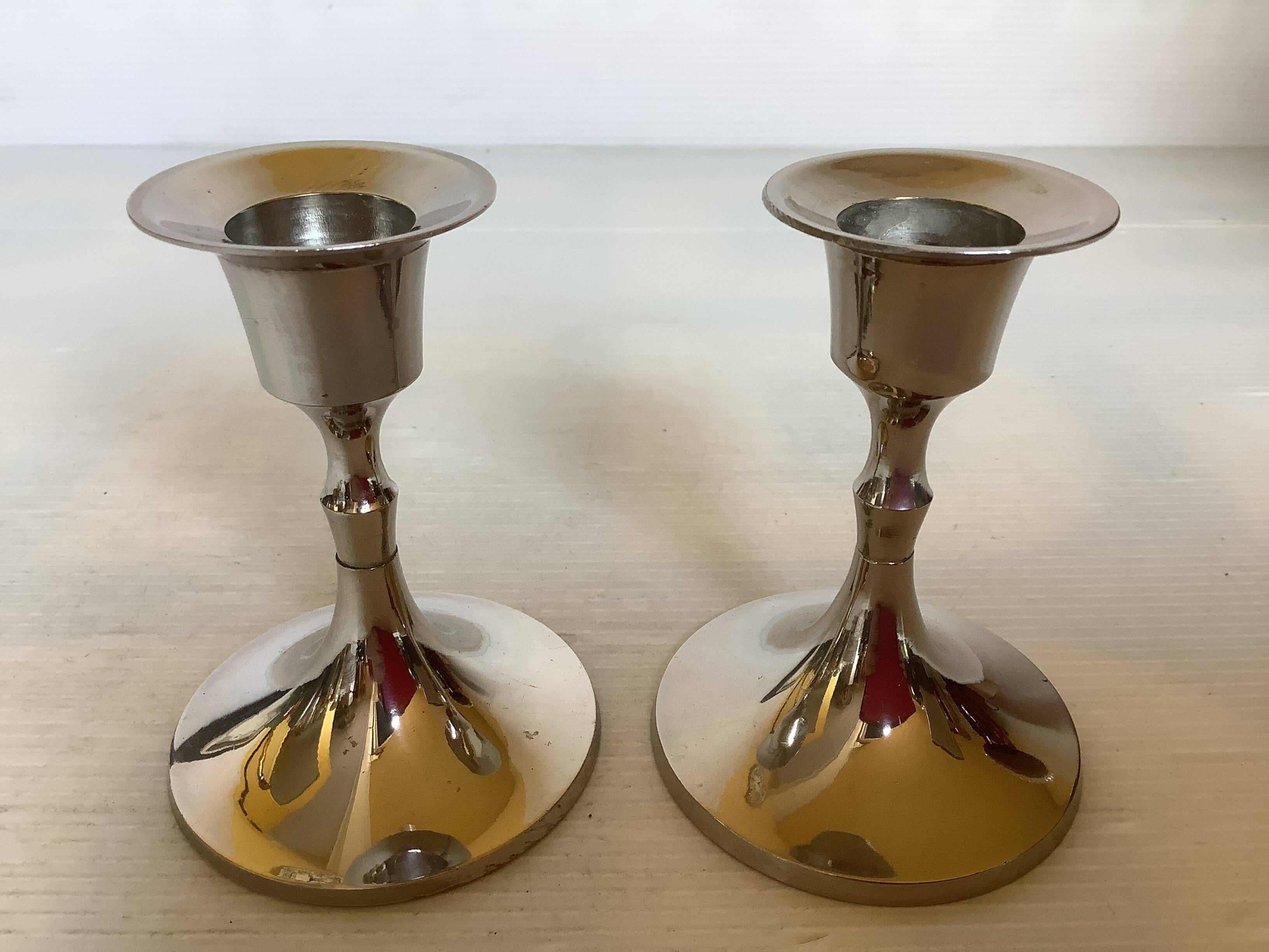 Pair of small silver metal tulip foot candle holders