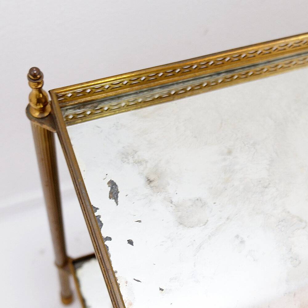 Two-tier side table with eglomisé mirror by Maison Jansen, French.