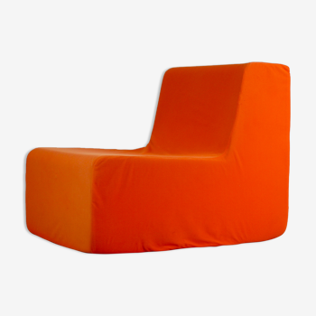Armchair "space age" foam and orange jersey. Circa 1970
