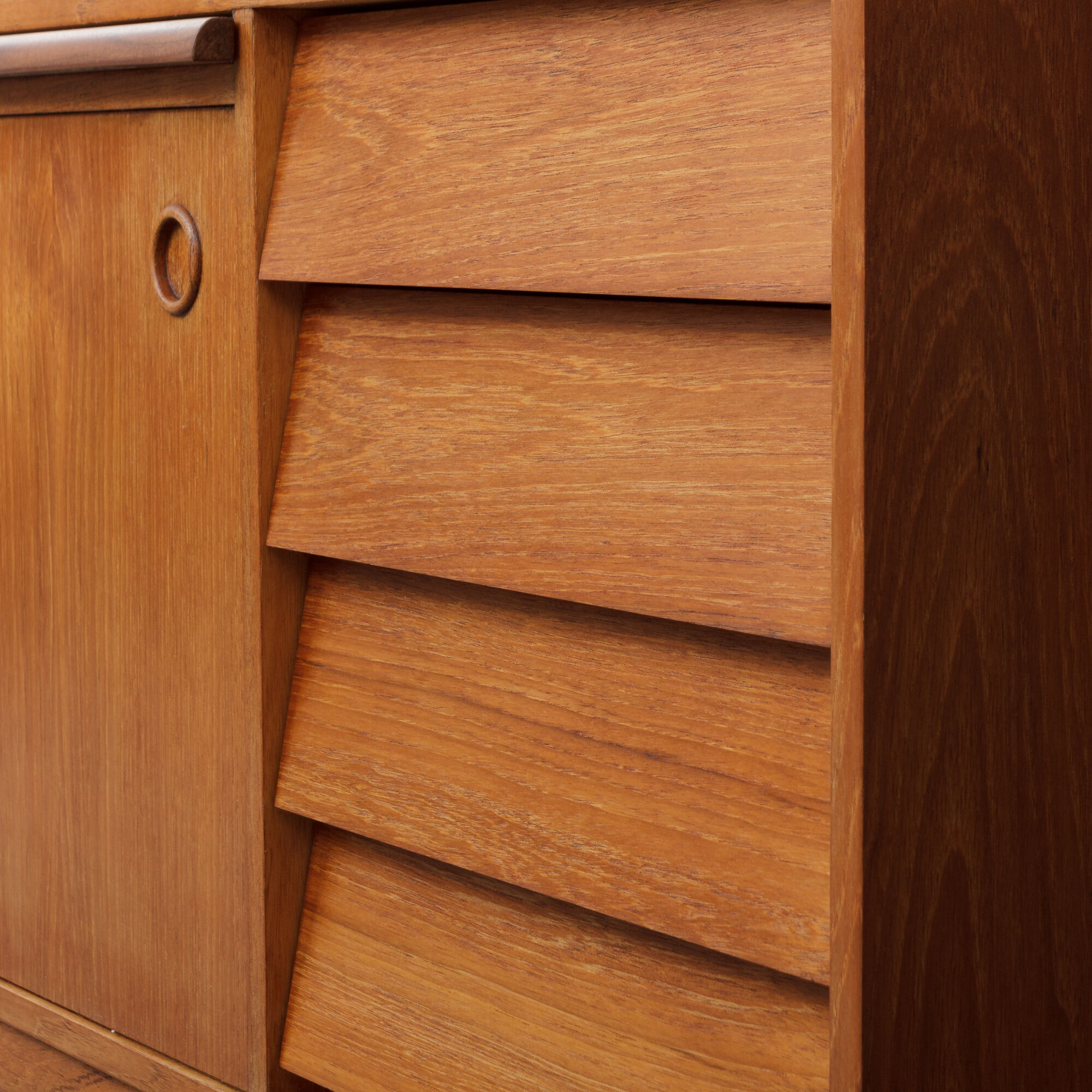 Small Danish teak sideboard with a pull out tray