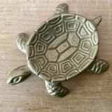 Vintage brass turtle pocket emptier