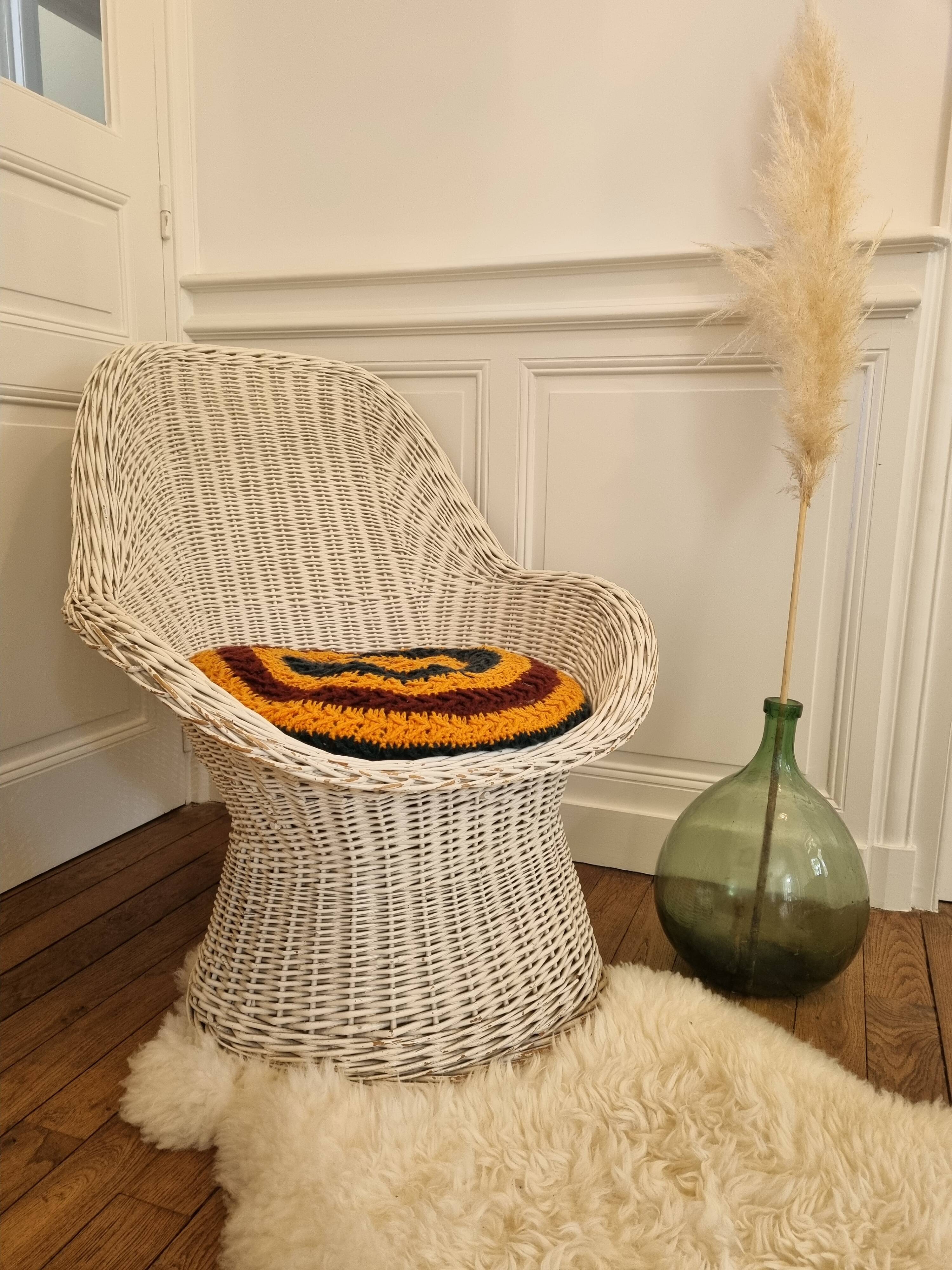 Vintage white rattan armchair