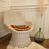 Vintage white rattan armchair