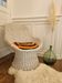 Vintage white rattan armchair