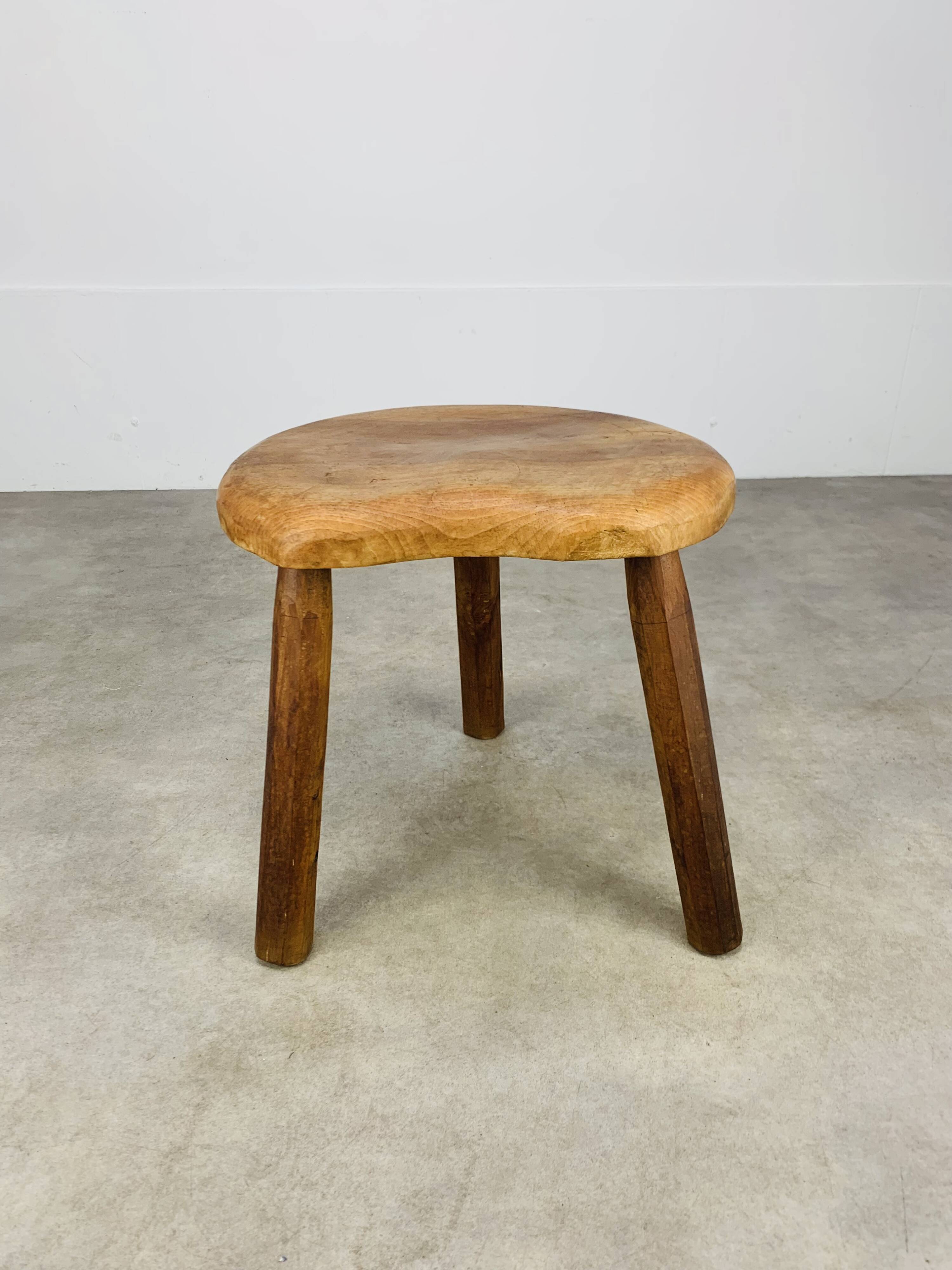 Brutalist tripod stool in solid wood