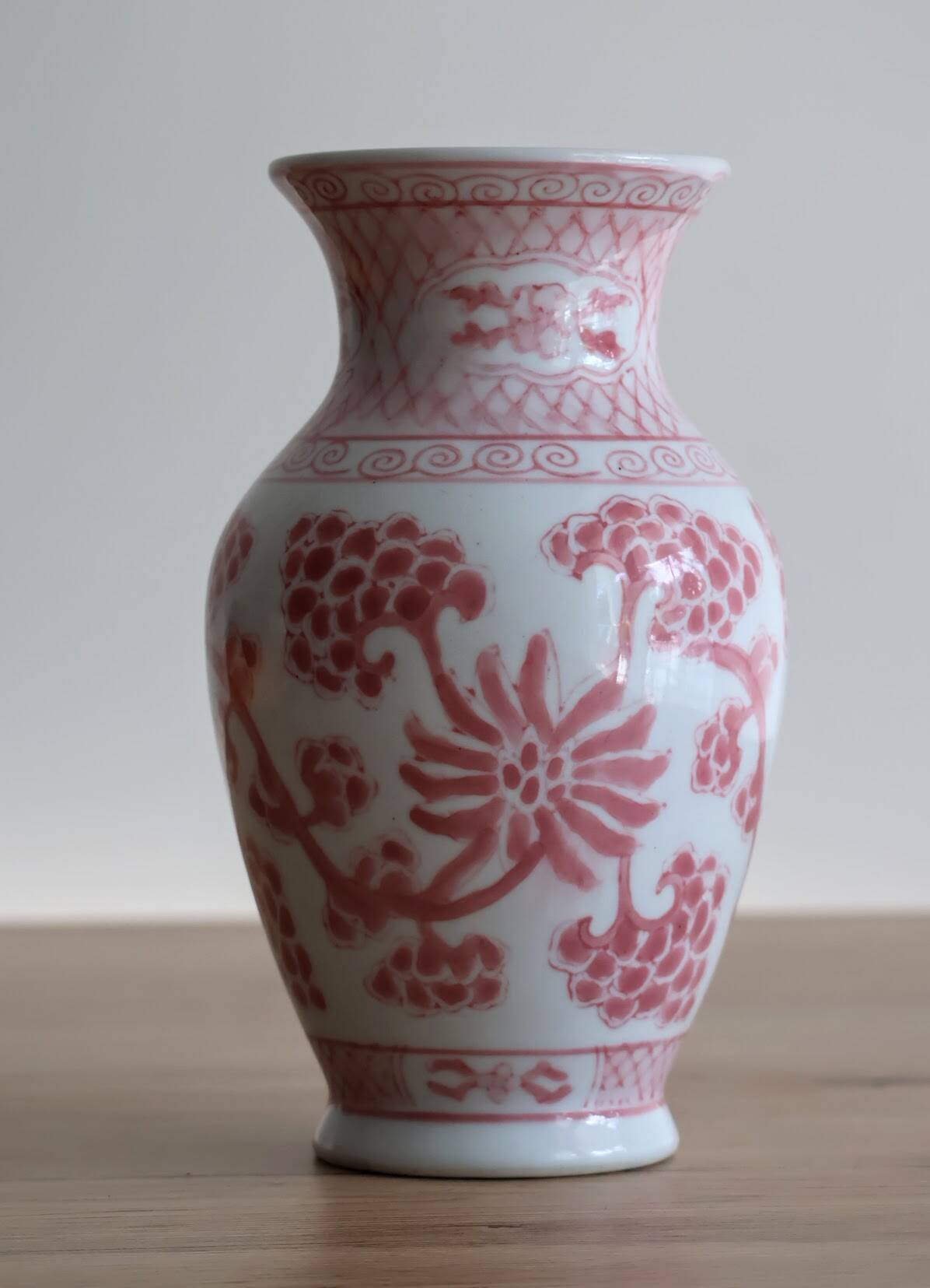 Chinese style flower vase with red and white flowers