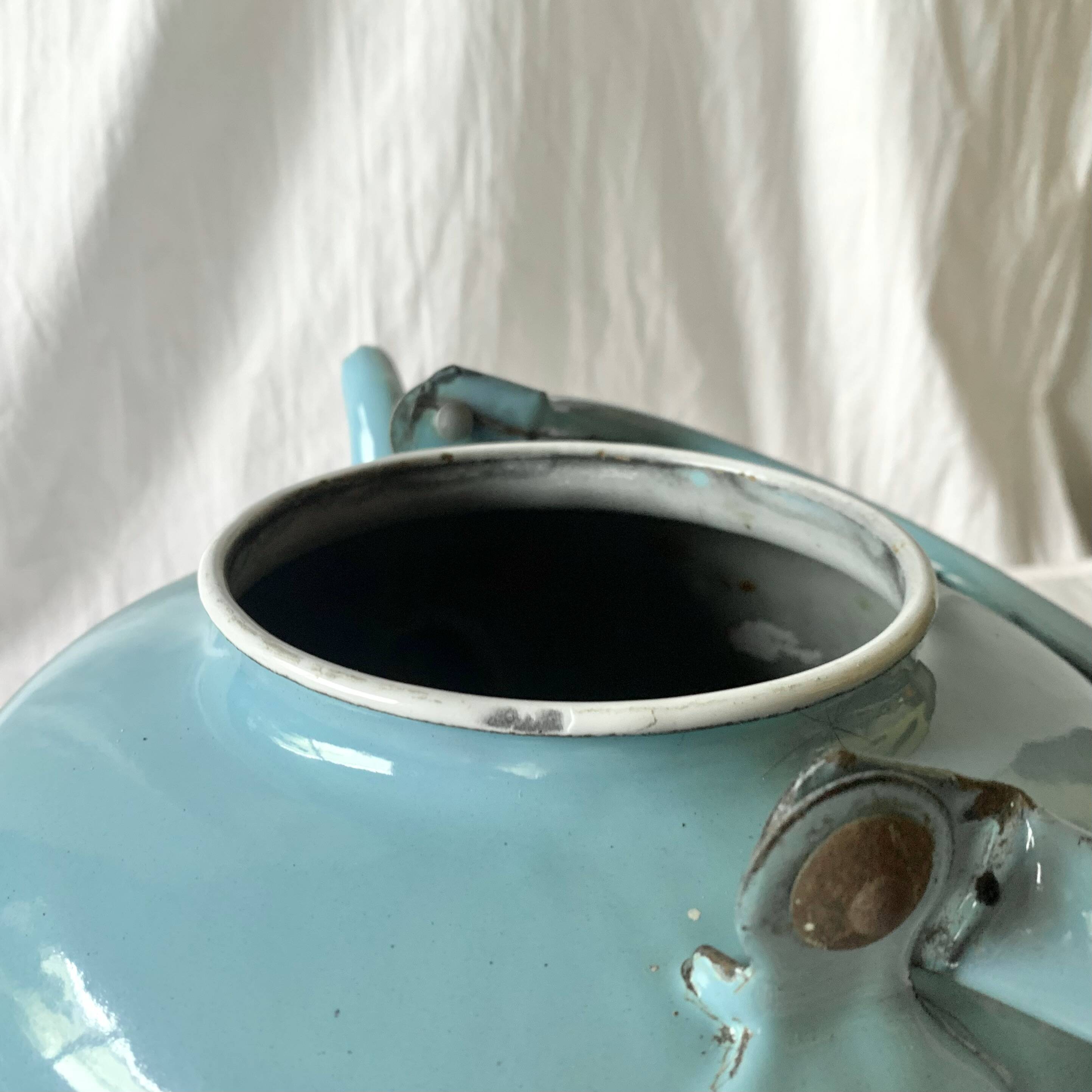 Large vintage kettle in blue enameled sheet metal