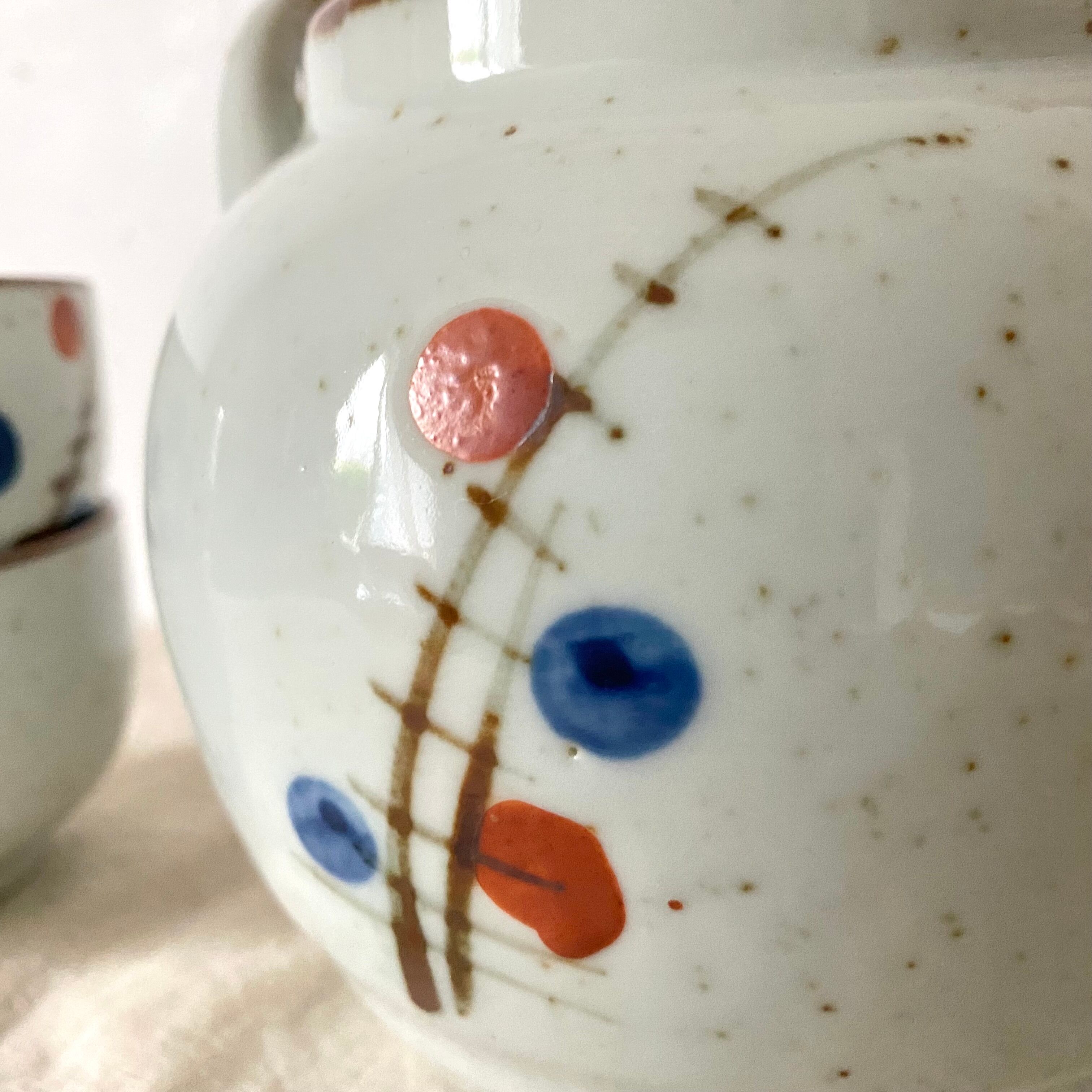 Stoneware teapot and vintage bowls