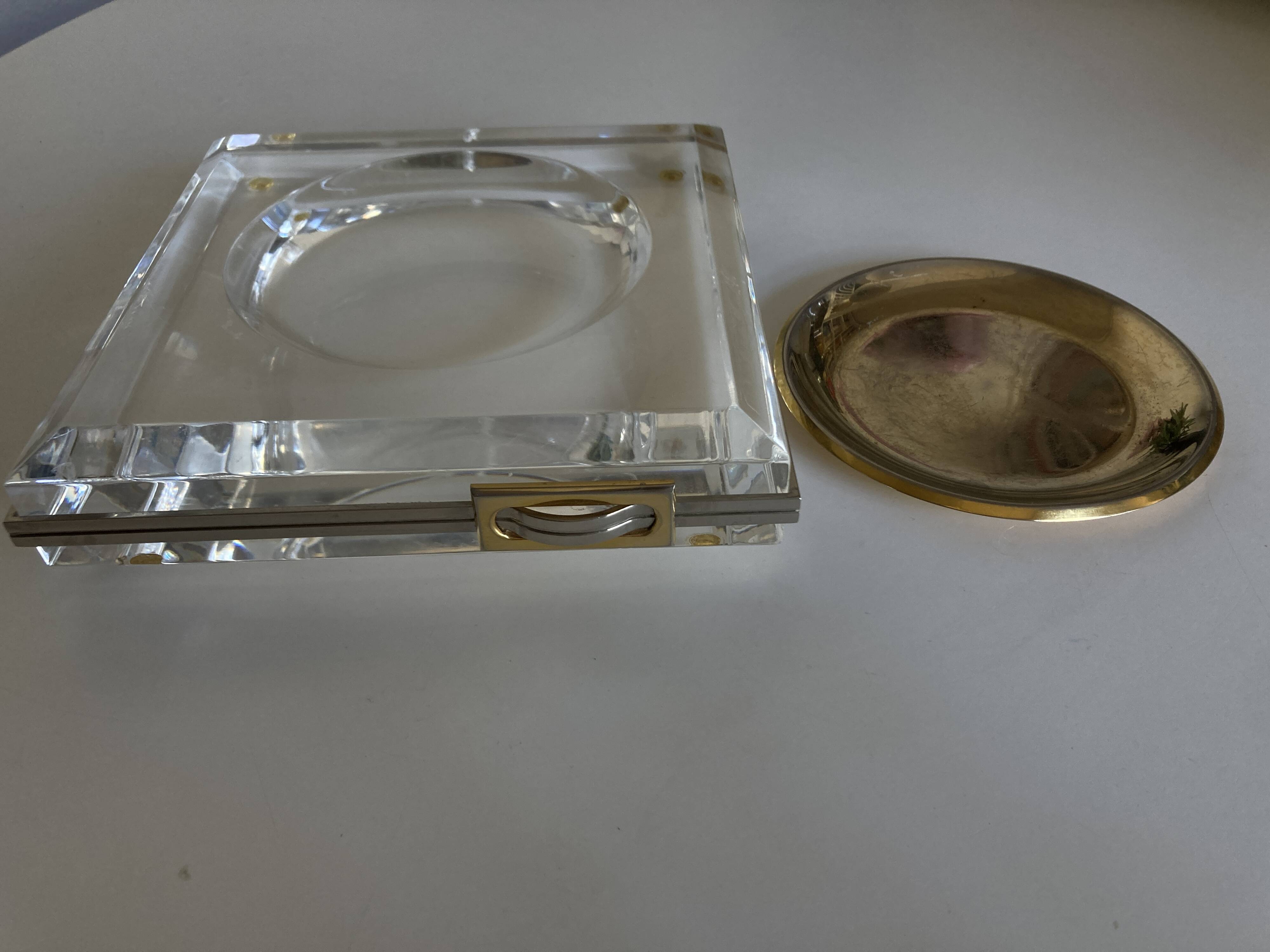 Plexiglas pocket emptier with brass and nickel silver surround, 1975, in the style of Pergay