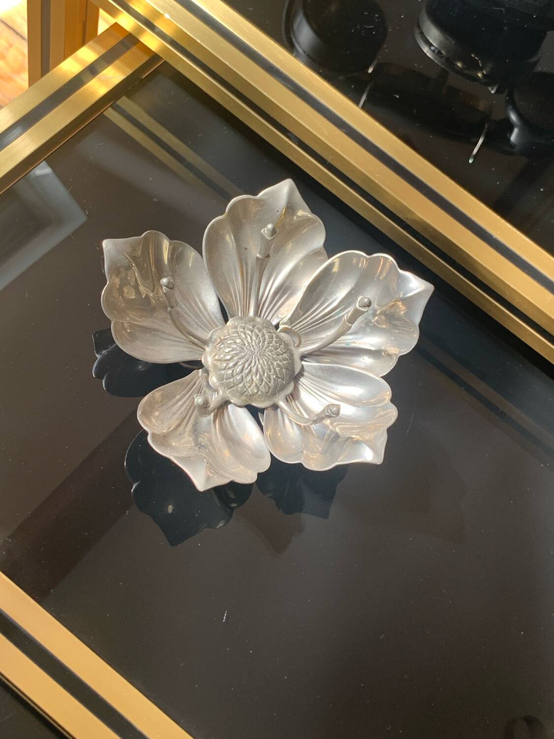 Silver metal flower with removable petals