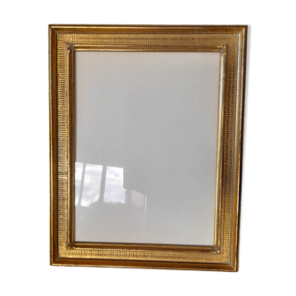 Antique frame with striated gilding