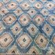Tapis oriental fait main xxeme fond bleu 307 cm x 222 cm