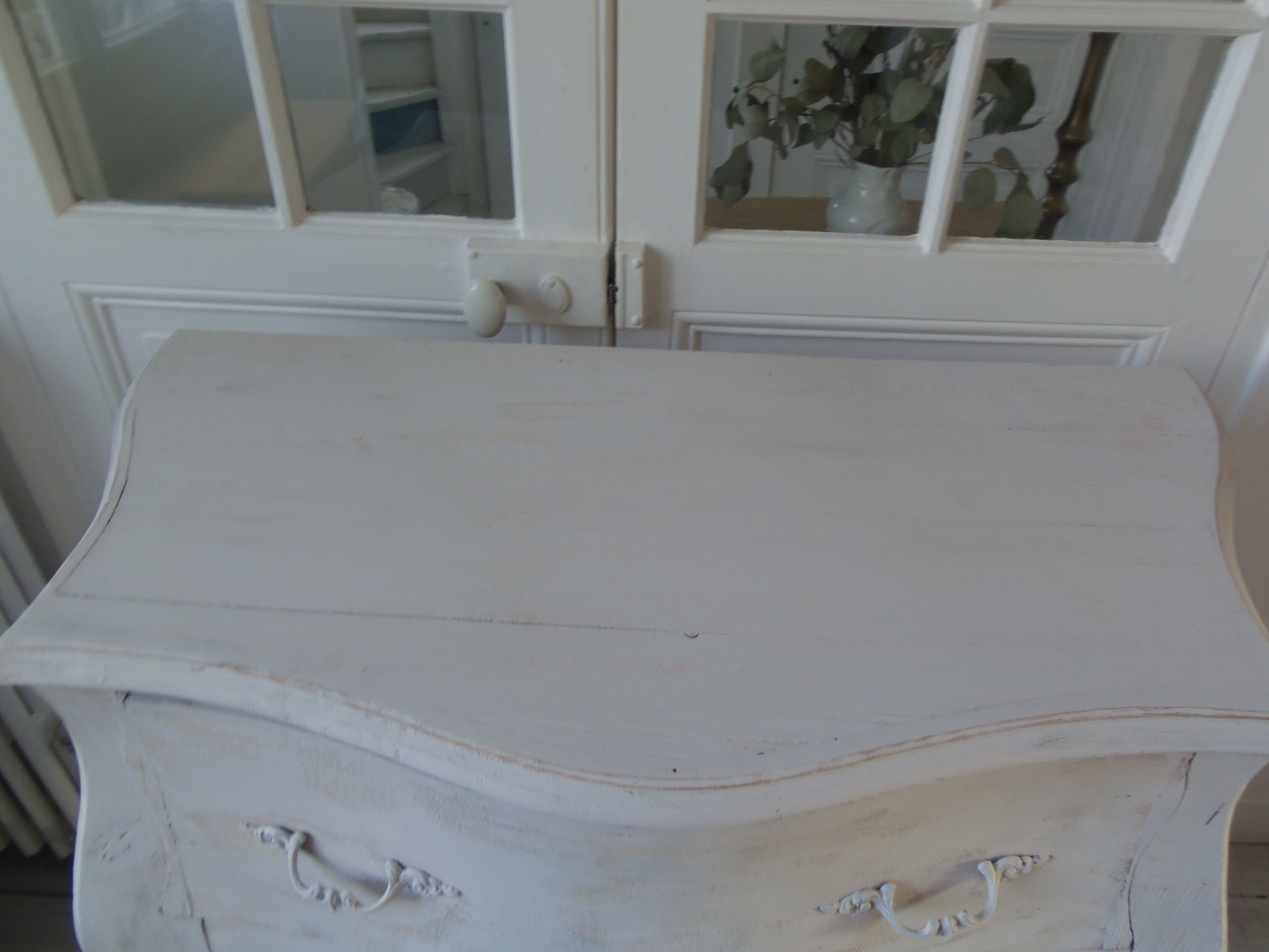 Curved patinated chest of drawers pearl grey waxed finish